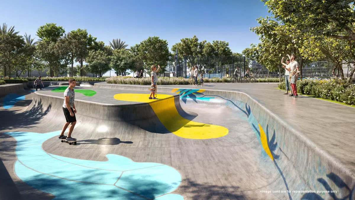 Kids play zone at Greenway, Emaar South, surrounded by greenery walking pathway and modern amenities.